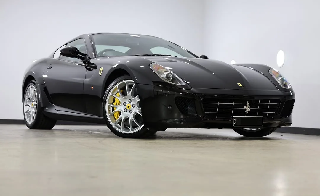 A black 2007 Ferrari 599 GTB Fiorano in the studio